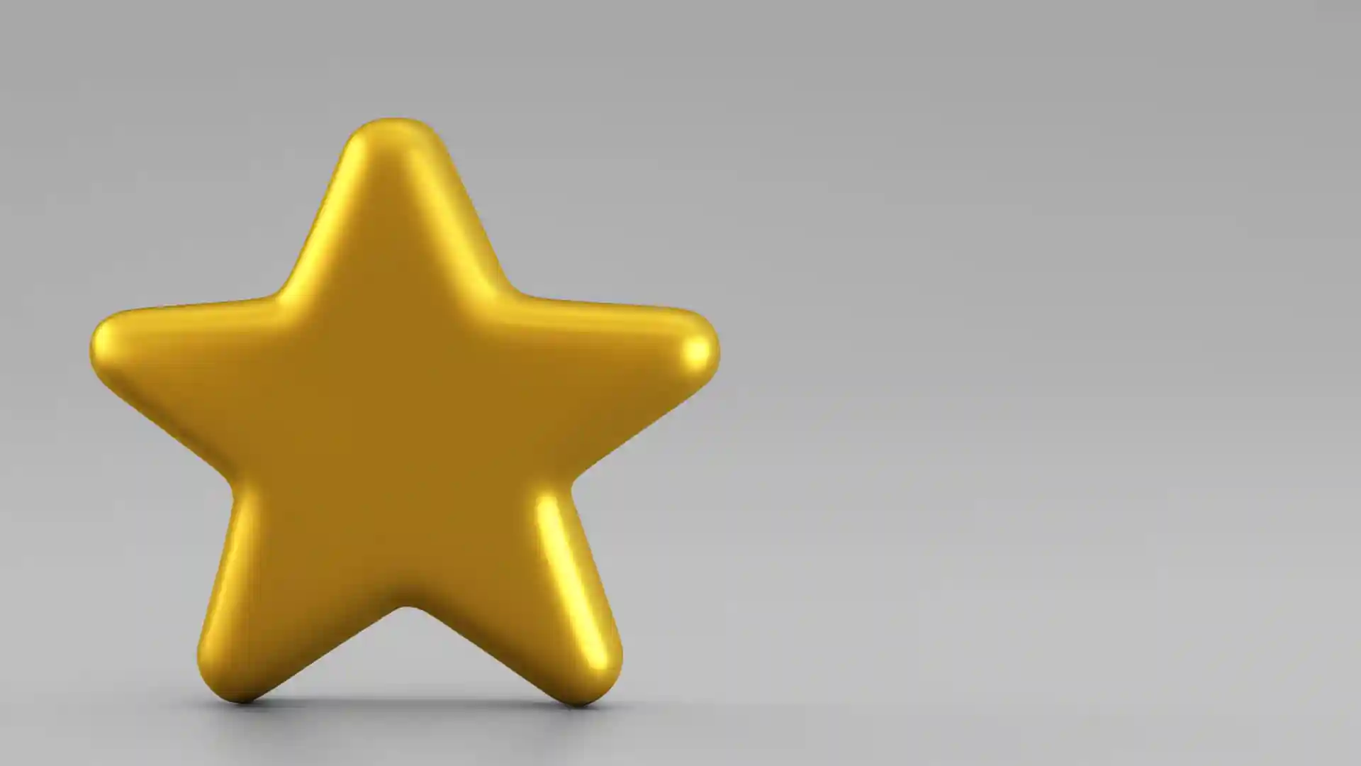 グレーの背景に立体的で黄色い星マークが一つ